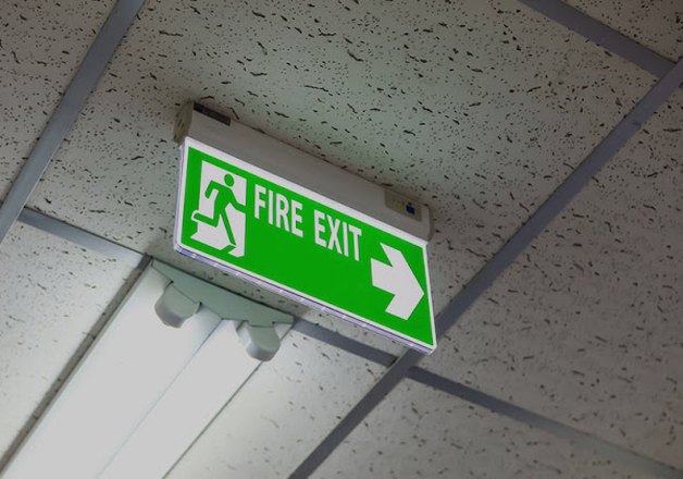 Illuminated fire exit sign